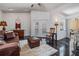Living room with black marble-style flooring and backyard views at 4847 Harbor Woods Dr, Palm Harbor, FL 34683