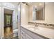 Bathroom featuring a large vanity, modern fixtures, and tile backsplash at 4917 Puritan Cir # 105, Tampa, FL 33617