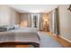 Serene bedroom featuring hardwood floors, soft lighting, and neutral decor at 4917 Puritan Cir # 105, Tampa, FL 33617