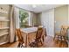 Bright dining room featuring a closet, hardwood floors, and natural light at 4917 Puritan Cir # 105, Tampa, FL 33617