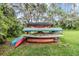 Stacked colorful kayaks for outdoor recreation in the community at 4917 Puritan Cir # 105, Tampa, FL 33617