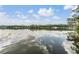 Scenic view of lake with sky and clouds reflected on the water's surface at 4917 Puritan Cir # 105, Tampa, FL 33617