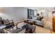Inviting living room featuring a comfortable sofa and decorative pillows on a patterned rug at 4917 Puritan Cir # 105, Tampa, FL 33617