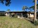 Spacious backyard featuring a screened lanai, ideal for outdoor relaxation at 5365 Dover Ne St, St Petersburg, FL 33703