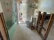 Bathroom with toilet and bathtub showing studs ready for renovation at 5365 Dover Ne St, St Petersburg, FL 33703