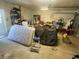 A peek into the garage with personal items and the garage door at 5365 Dover Ne St, St Petersburg, FL 33703