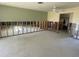 Large living room with exposed studs ready for renovation at 5365 Dover Ne St, St Petersburg, FL 33703