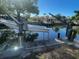 Waterfront property featuring a boat lift at 5365 Dover Ne St, St Petersburg, FL 33703