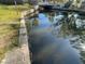 Canal view with a concrete seawall at 5365 Dover Ne St, St Petersburg, FL 33703