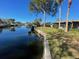 Picturesque waterfront property with a canal and lush landscaping at 5365 Dover Ne St, St Petersburg, FL 33703