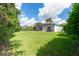 Expansive backyard with a screened lanai, offering a private outdoor living space at 6116 Skylarkcrest Dr, Lithia, FL 33547