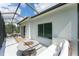 The screened lanai offers a cozy seating area, great for entertaining and enjoying the outdoors at 6116 Skylarkcrest Dr, Lithia, FL 33547
