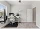 A bright bedroom features a workspace with monitors and natural light at 6731 Rocky Park St, Tampa, FL 33625