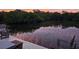 Beautiful backyard with relaxing lounge chairs, ideal for enjoying peaceful sunsets at 6904 11Th Ave E, Palmetto, FL 34221