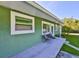Inviting home exterior with a covered patio and comfortable seating at 6904 11Th Ave E, Palmetto, FL 34221