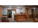 Spacious living room featuring wood accents and open doorways ready for renovation at 6904 11Th Ave E, Palmetto, FL 34221