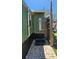 Outdoor shower with brick flooring and multiple spray options adding convenience to the outdoor experience at 6904 11Th Ave E, Palmetto, FL 34221