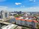Breathtaking aerial view of waterfront condo building near downtown, featuring boat docks and city skyline views at 700 S Harbour Island Blvd # 740, Tampa, FL 33602