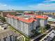 Aerial view showcasing the condo building's central courtyard pool and private boat docks at 700 S Harbour Island Blvd # 740, Tampa, FL 33602