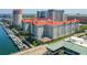 Waterfront condo building with private boat slips, manicured grounds, and city views at 700 S Harbour Island Blvd # 740, Tampa, FL 33602