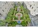 A beautiful aerial view of an inner courtyard with lush tropical landscaping and a charming fountain at 700 S Harbour Island Blvd # 740, Tampa, FL 33602