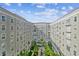 Charming courtyard with mature palm trees and decorative fountain set within a well-maintained condo building at 700 S Harbour Island Blvd # 740, Tampa, FL 33602