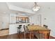 Charming dining area adjacent to the kitchen, featuring hardwood floors and stylish lighting at 700 S Harbour Island Blvd # 740, Tampa, FL 33602