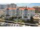 Beautiful condo building featuring a central pool area, boat docks, and well-maintained landscaping at 700 S Harbour Island Blvd # 740, Tampa, FL 33602