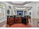 Kitchen area with dark wood cabinetry, granite countertops, and stainless steel appliances at 700 S Harbour Island Blvd # 740, Tampa, FL 33602
