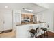 Updated kitchen with stainless steel appliances, granite countertops, and breakfast bar at 700 S Harbour Island Blvd # 740, Tampa, FL 33602
