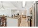 Kitchen with granite countertops and stainless appliances and an opening into the living area at 700 S Harbour Island Blvd # 740, Tampa, FL 33602
