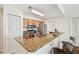 Kitchen with granite countertops and stainless appliances with additional seating at the counter at 700 S Harbour Island Blvd # 740, Tampa, FL 33602