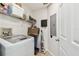 Convenient laundry room featuring modern washer and dryer units, offering ease and efficiency at 700 S Harbour Island Blvd # 740, Tampa, FL 33602
