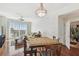 Inviting living room and dining area featuring hardwood floors and large windows with city views at 700 S Harbour Island Blvd # 740, Tampa, FL 33602