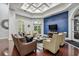 Lobby area with blue accent wall, coffered ceilings, multiple seating options and natural light at 700 S Harbour Island Blvd # 740, Tampa, FL 33602