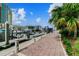 Picturesque marina with various boats, a paved walkway, and gorgeous views of downtown buildings at 700 S Harbour Island Blvd # 740, Tampa, FL 33602