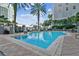 Inviting community pool surrounded by lounge chairs and palm trees, creating a resort-like atmosphere at 700 S Harbour Island Blvd # 740, Tampa, FL 33602