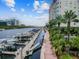 Picturesque waterfront view with boats docked, lush landscaping, and scenic river views at 700 S Harbour Island Blvd # 740, Tampa, FL 33602