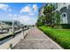Beautiful waterfront walkway with lush landscaping, a nearby marina, and stunning city views at 700 S Harbour Island Blvd # 740, Tampa, FL 33602