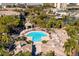 Aerial view of community pool and surrounding greenery and landscaping at 716 Seagate Dr # 716, Tampa, FL 33602