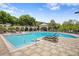 Relax by the sparkling community pool with plenty of lounge chairs and shaded seating areas for residents at 716 Seagate Dr # 716, Tampa, FL 33602
