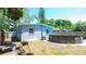 Backyard featuring an above ground pool and a grill at 7428 36Th N Ave, St Petersburg, FL 33710
