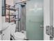 Bathroom featuring modern tile, updated sink and frosted glass shower door at 7428 36Th N Ave, St Petersburg, FL 33710