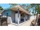 A covered patio with ceiling fans and plenty of seating at 7428 36Th N Ave, St Petersburg, FL 33710