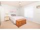 Serene bedroom with a comfortable bed, soft lighting, and calming decor at 7812 Turnbridge Dr, Port Richey, FL 34668