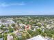Aerial view of the home in a residential area, surrounded by tree-lined streets and neighborhood charm at 8130 129Th N Ln, Seminole, FL 33776