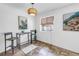 Cozy dining area with tile flooring, a wicker pendant light, and a window with blinds at 8130 129Th N Ln, Seminole, FL 33776
