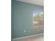 Bedroom with window to the outdoors and tile floor at 8408 Nuzum Rd, Brooksville, FL 34613