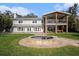 Expansive backyard featuring a stone spa, pristine lawn, and beautiful outdoor space, perfect for entertaining and relaxation at 8488 35Th N Ave, St Petersburg, FL 33710