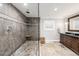Bathroom showcasing a large walk-in shower with bench and stylish vanity at 8488 35Th N Ave, St Petersburg, FL 33710